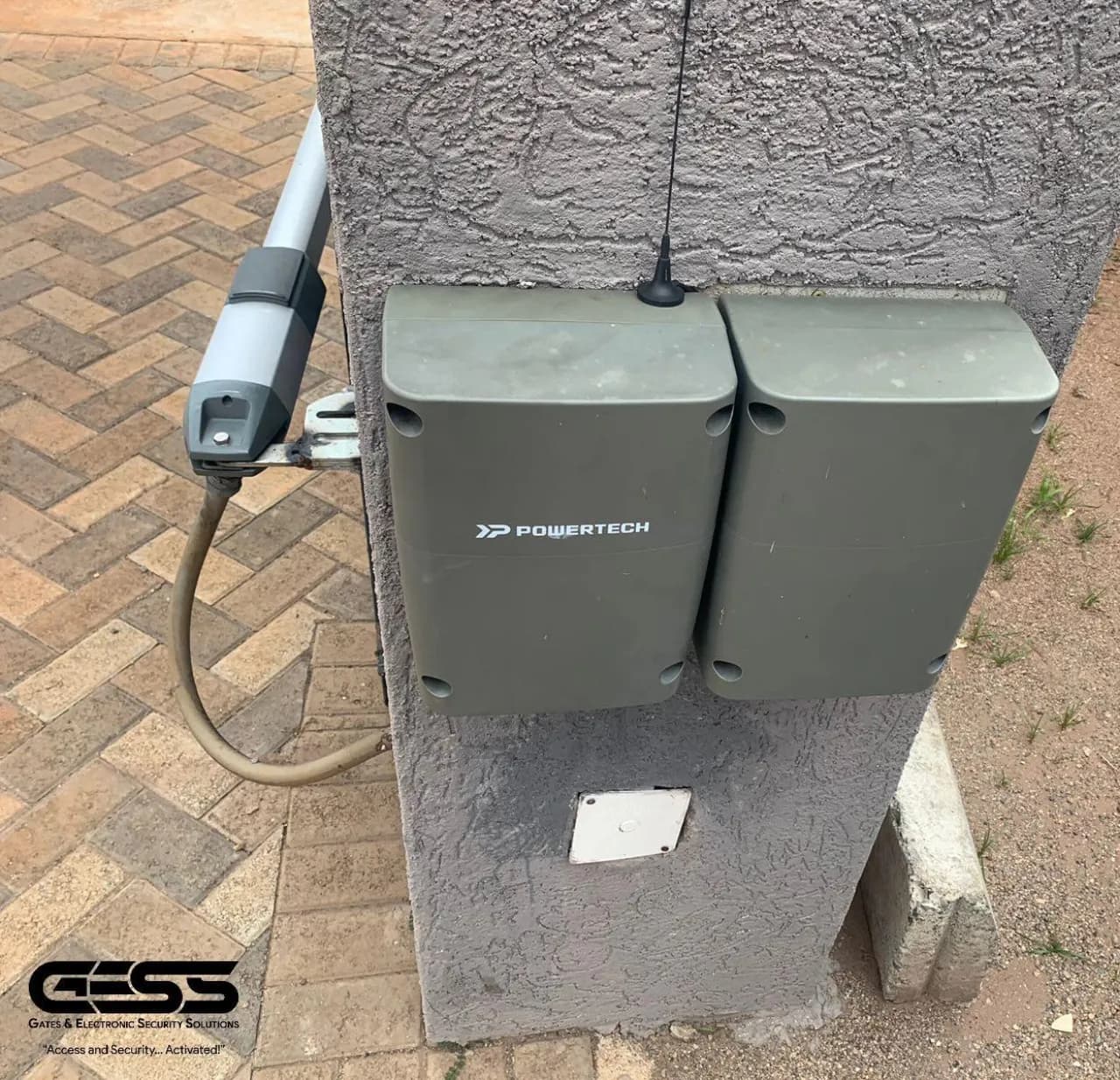 Two Powertech control enclosures and an aerial mounted on a gate pillar